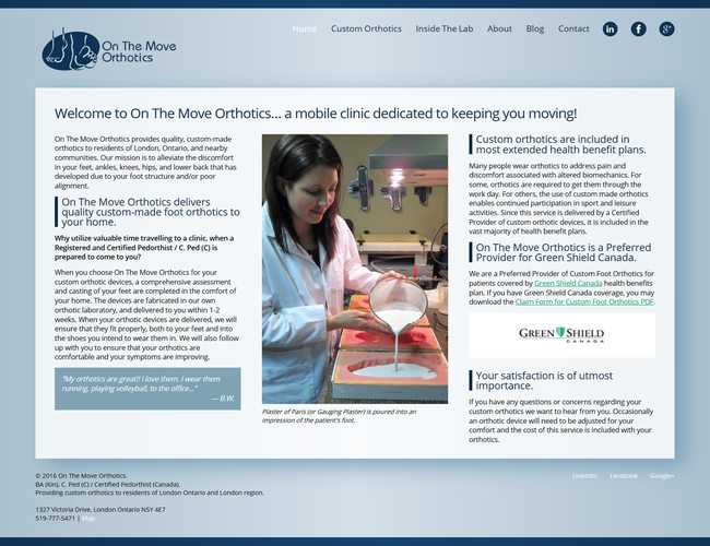 OTMO's responsive website displayed on an LCD monitor